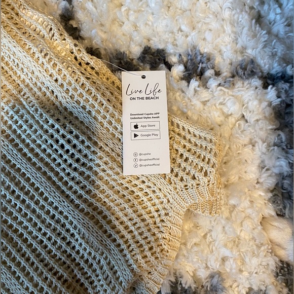 Ariya Crochet Pull Over Split Cover Up
F/Sand - Picture 3 of 6